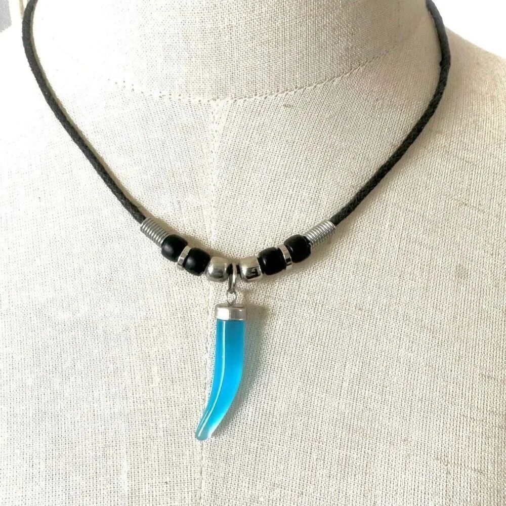 Black and silver tone beaded blue tusk necklace on black cord